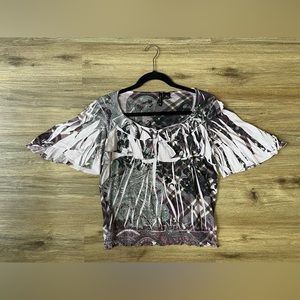 Size is a Petite Medium. Purple rhinestone designed blouse.